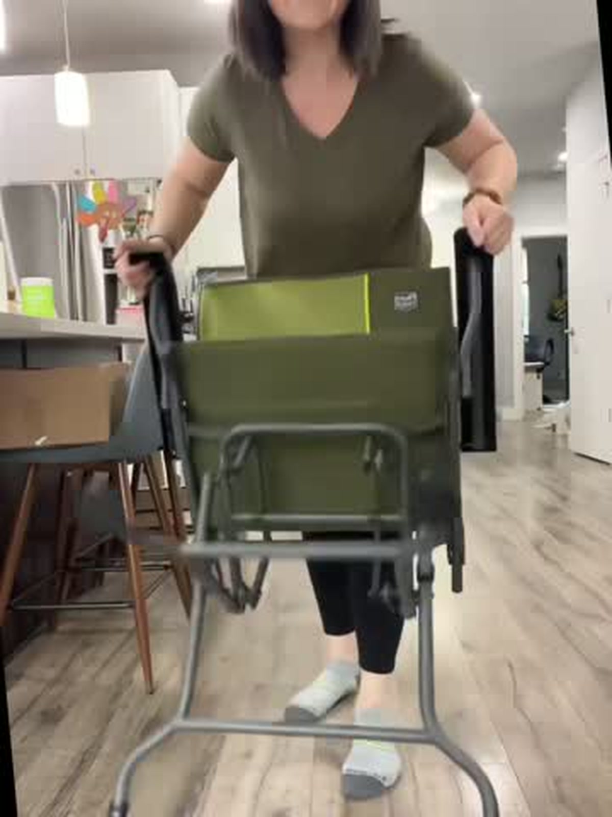 Rear frame and folding construction of the portable glider chair